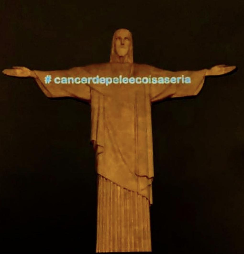 #DezembroLaranja2020: Cristo Redentor veste a camisa da campanha para conscientizar sobre o câncer de pele